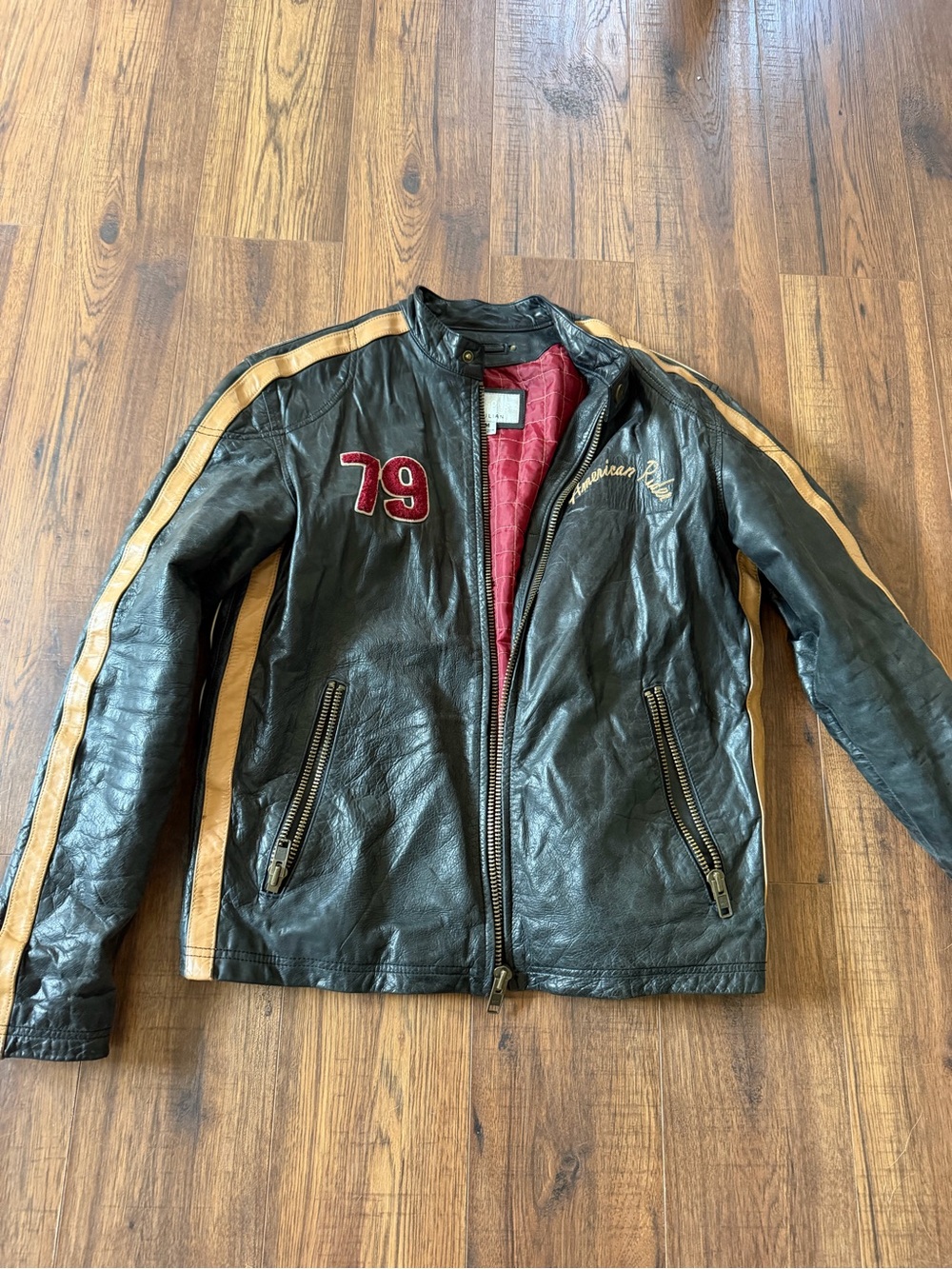 Wilsons Leather Black Leather Bomber Jacket with Tan Sleeve Stripes